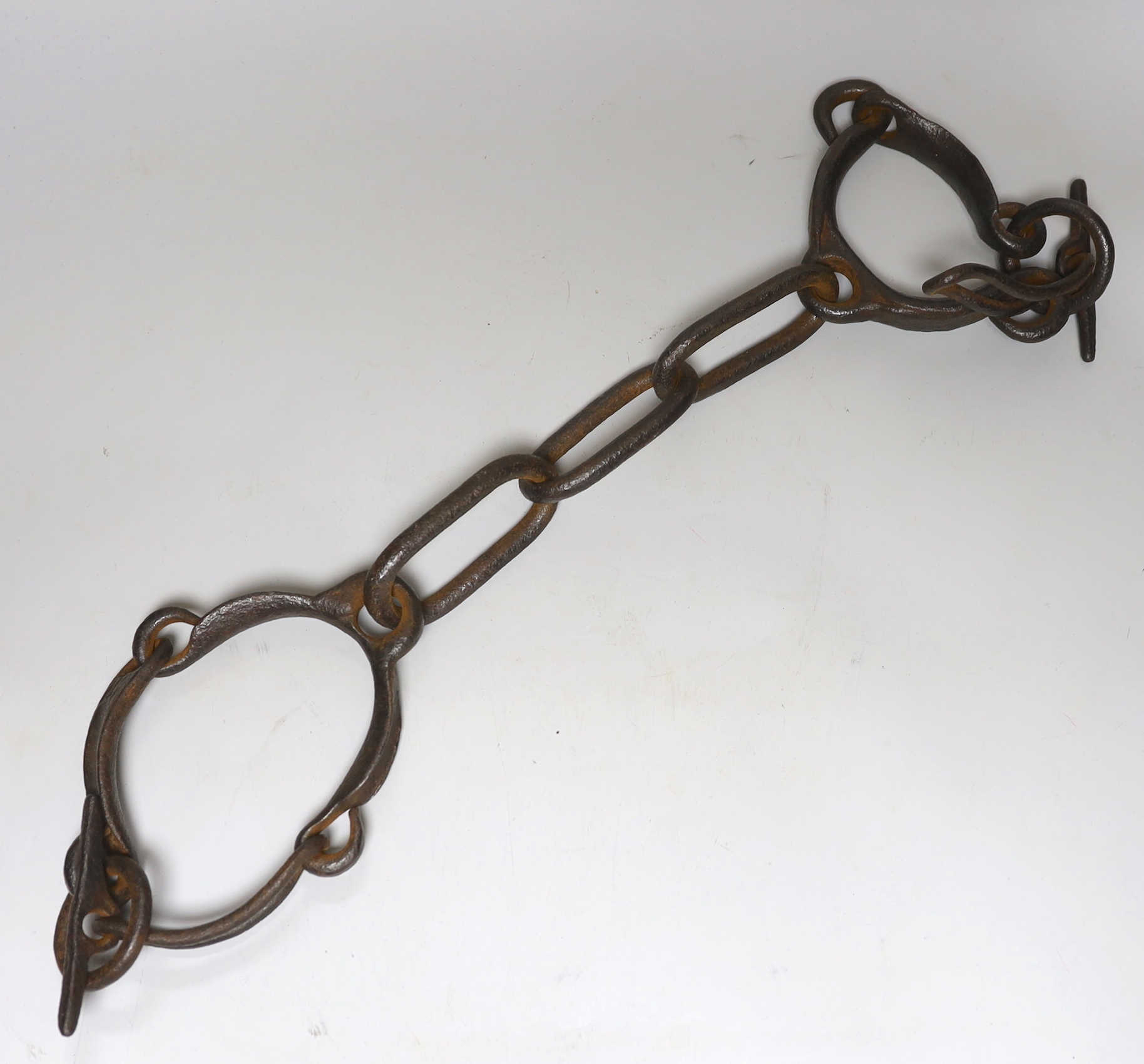 A set of iron slavery shackles, 18/19th century